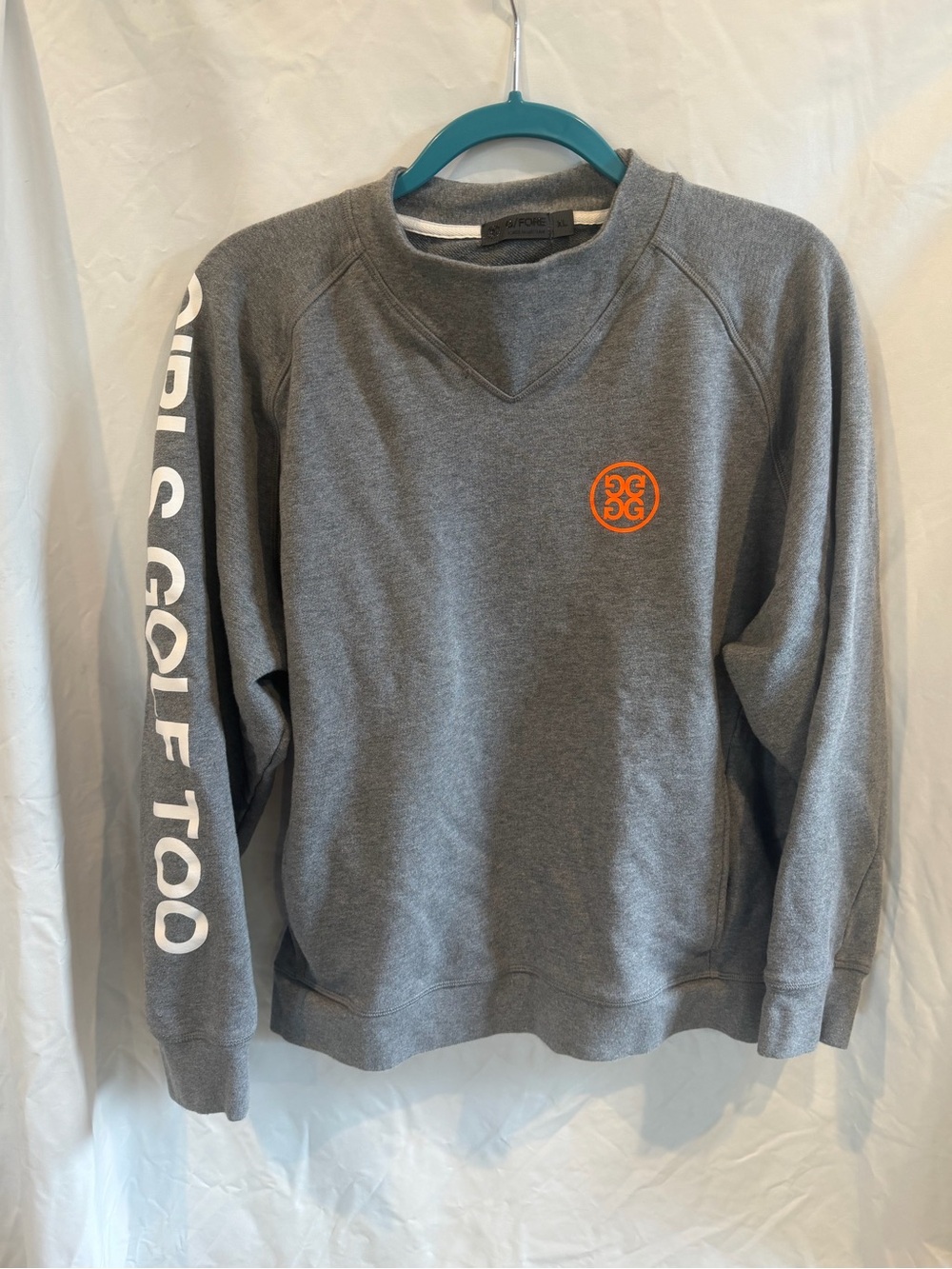 G/FORE Grey Crewneck Sweatshirt with Orange Chest Emblem and White Sleeve Text